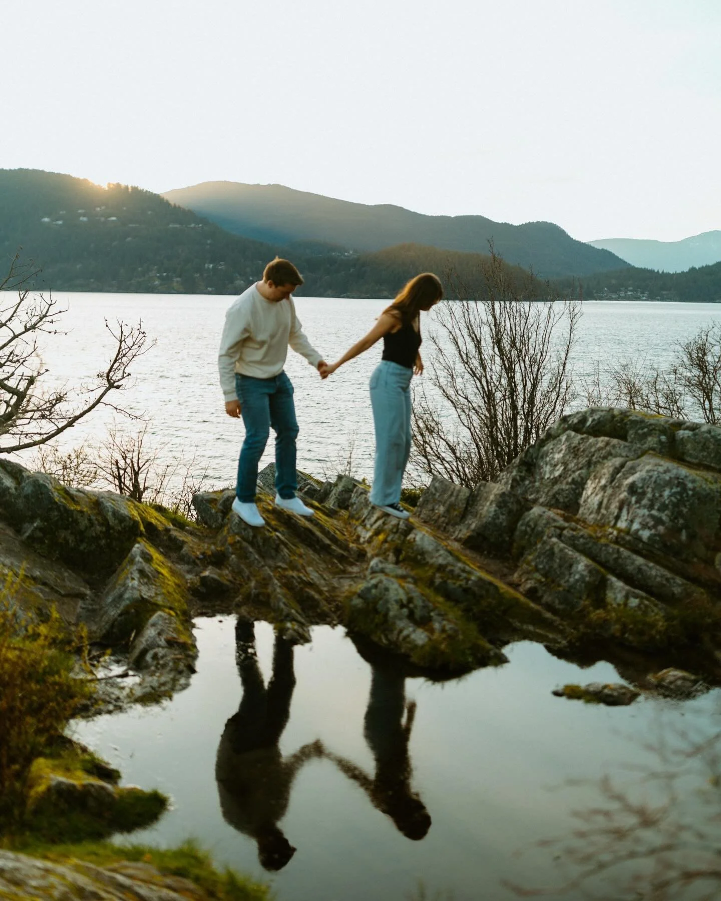 Some more sunset snippets into Kirsten &amp; Mason&rsquo;s engagement session.

A March evening that felt like summer had finally arrived on the coast. Sun drenched skies, waves, and cliff tops. It was an evening of splashing their toes in the water,