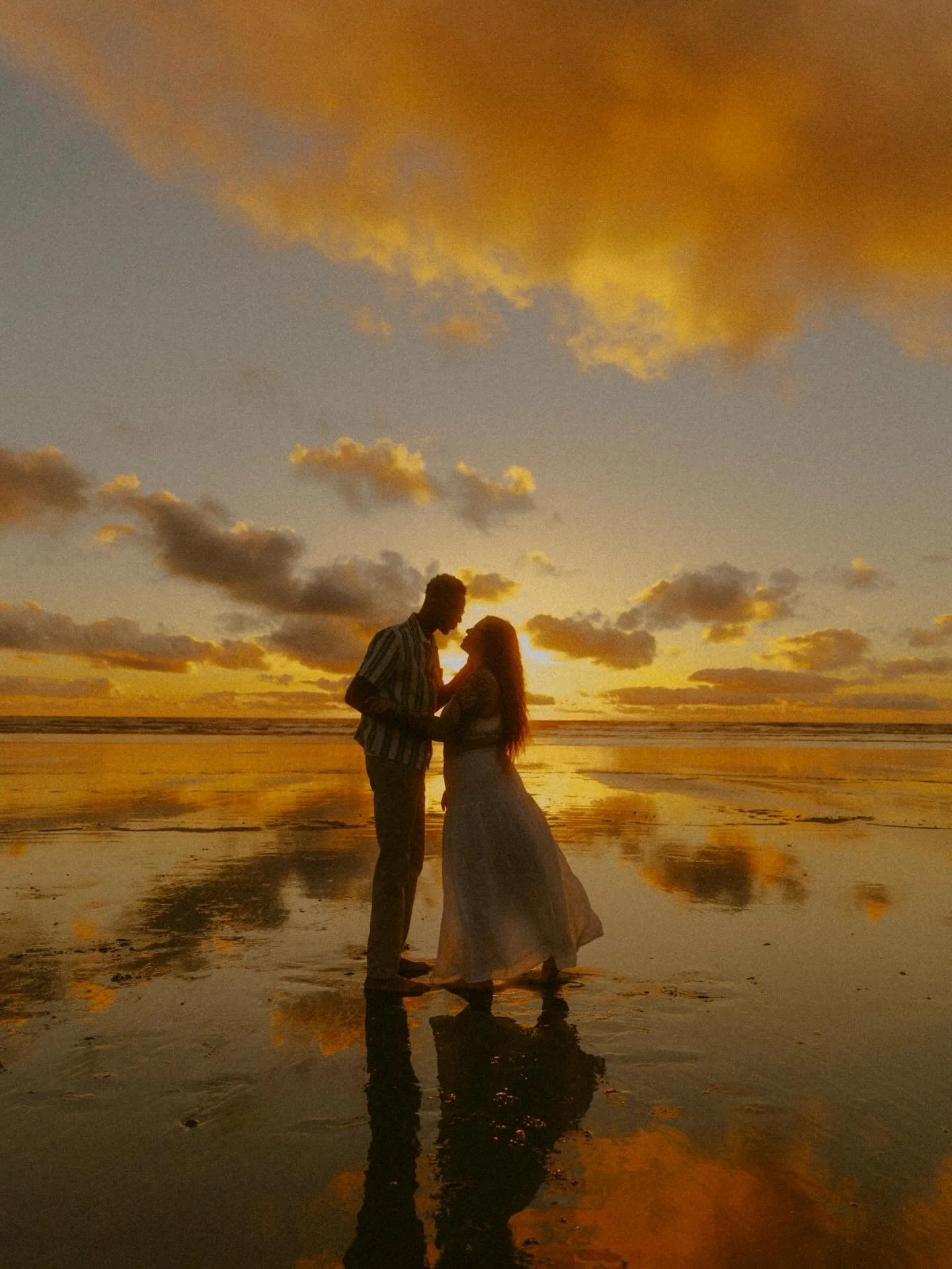 Enveloped by the most unreal sunset I&rsquo;ve ever photographed 🌅

I knew my time with Jillian and Mekhel was going to be magical. Playing along the wide open sand of Ocean Shores. A place that&rsquo;s become special to me after many years of road 