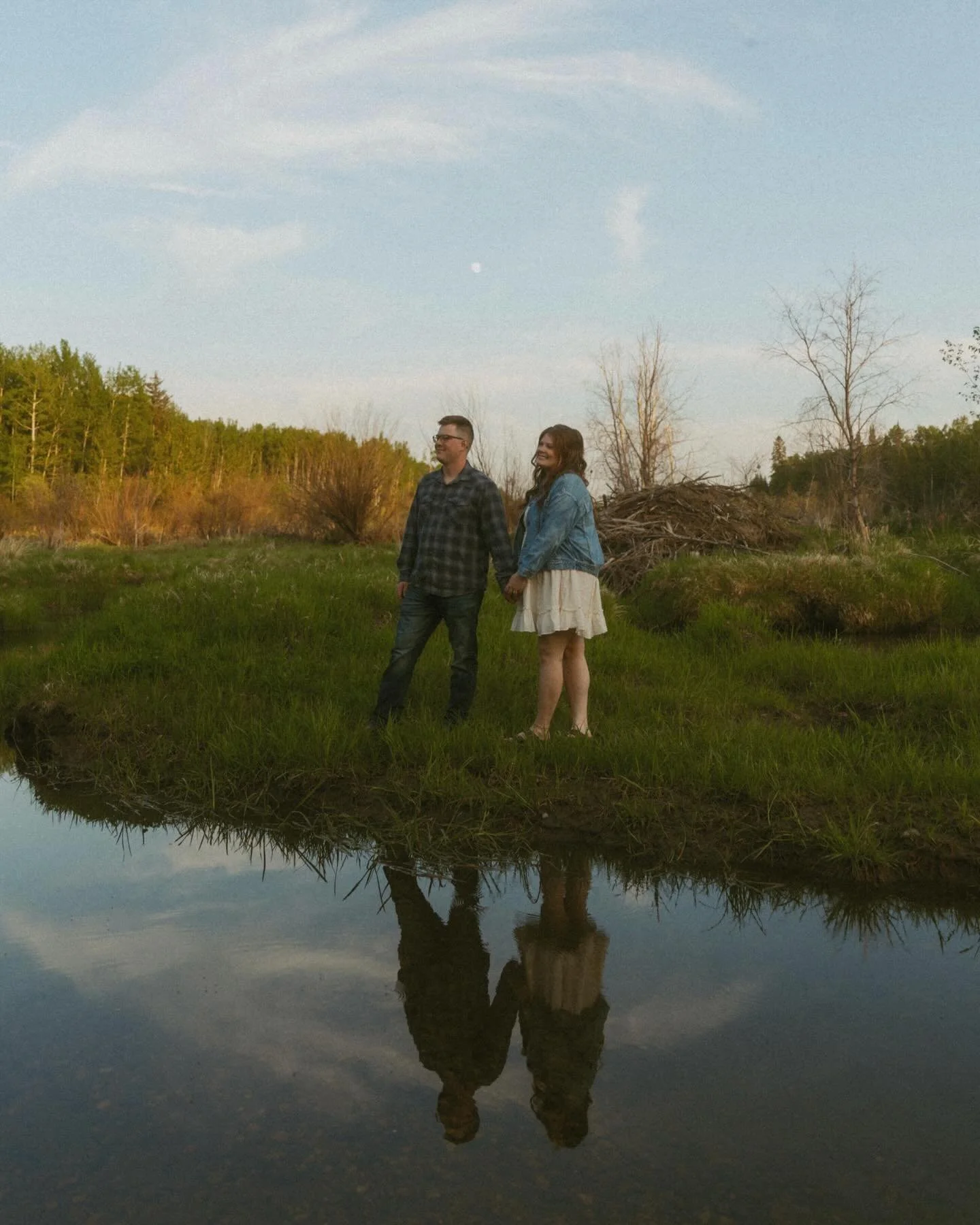 Oh the adventure of this night 🌾🌙

Kaelyn &amp; Blaine under the moon, along the dock, amongst the lilacs, and everywhere in between. We spent the evening exploring all the nooks and crannies of rural Alberta. A truly stunning night. 

I love adven