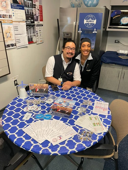 SkyWest Flight Attendants at a crew room table with campaign materials