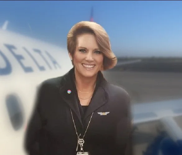 SkyWest Flight Attendant on the ramp beside the aircraft