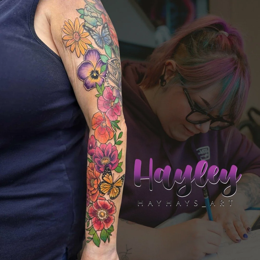 These beautiful colours are almost as vibrant as Hayley! Taking custom designs  from bold colour to fine line - @hayhay_tattoos can design what you need 🤩. Book a free consultation today using the link in our bio or website www.sakredskinstudio.com