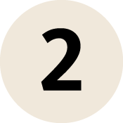 Number 2 on a beige circular background.