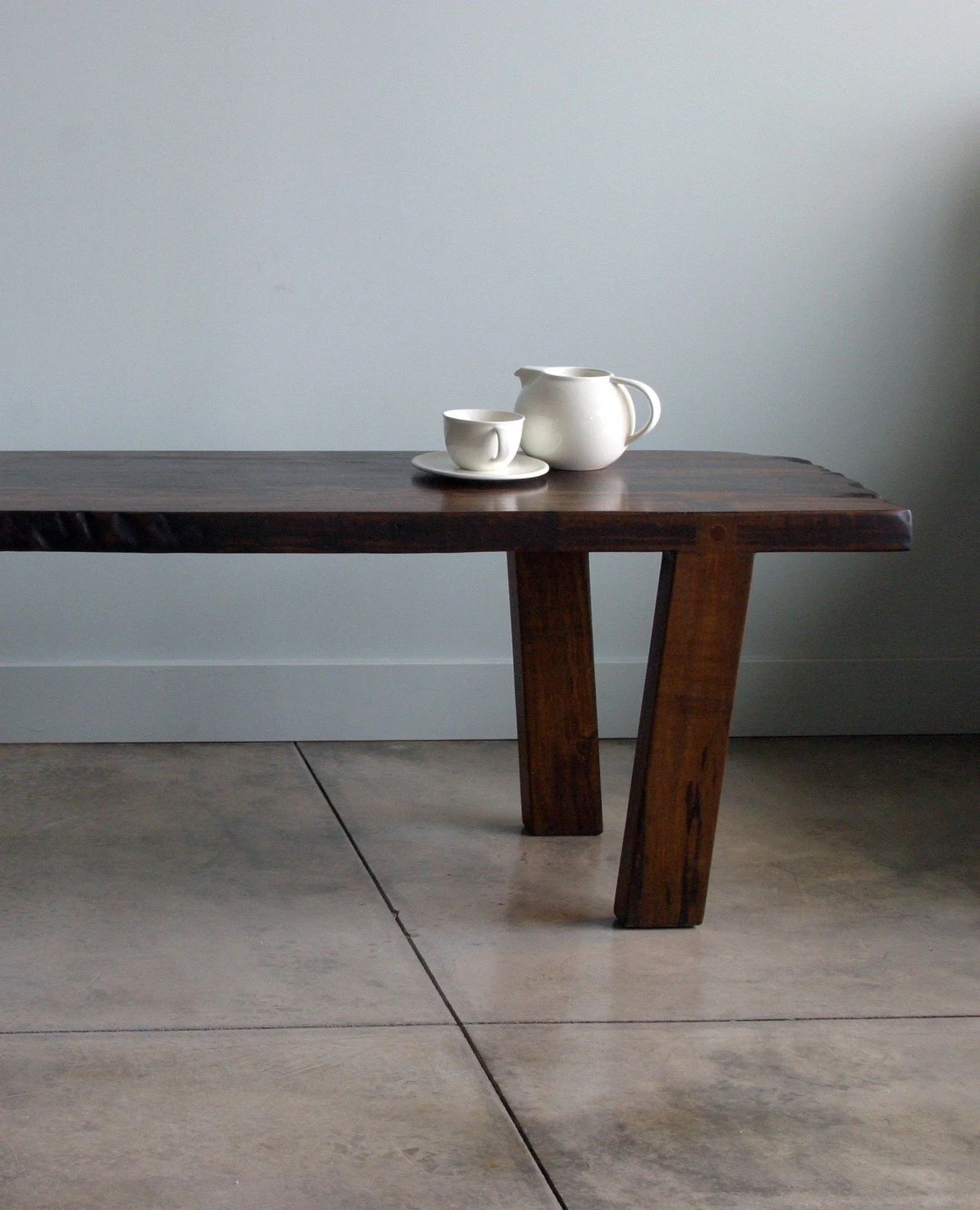 The Walking Bench began as a simple tea-bar seat and became a quiet character in the room. Part furniture, part art, with classic joinery and legs that look mid-stride &mdash; a small reminder that even everyday pieces can feel a little more playful.