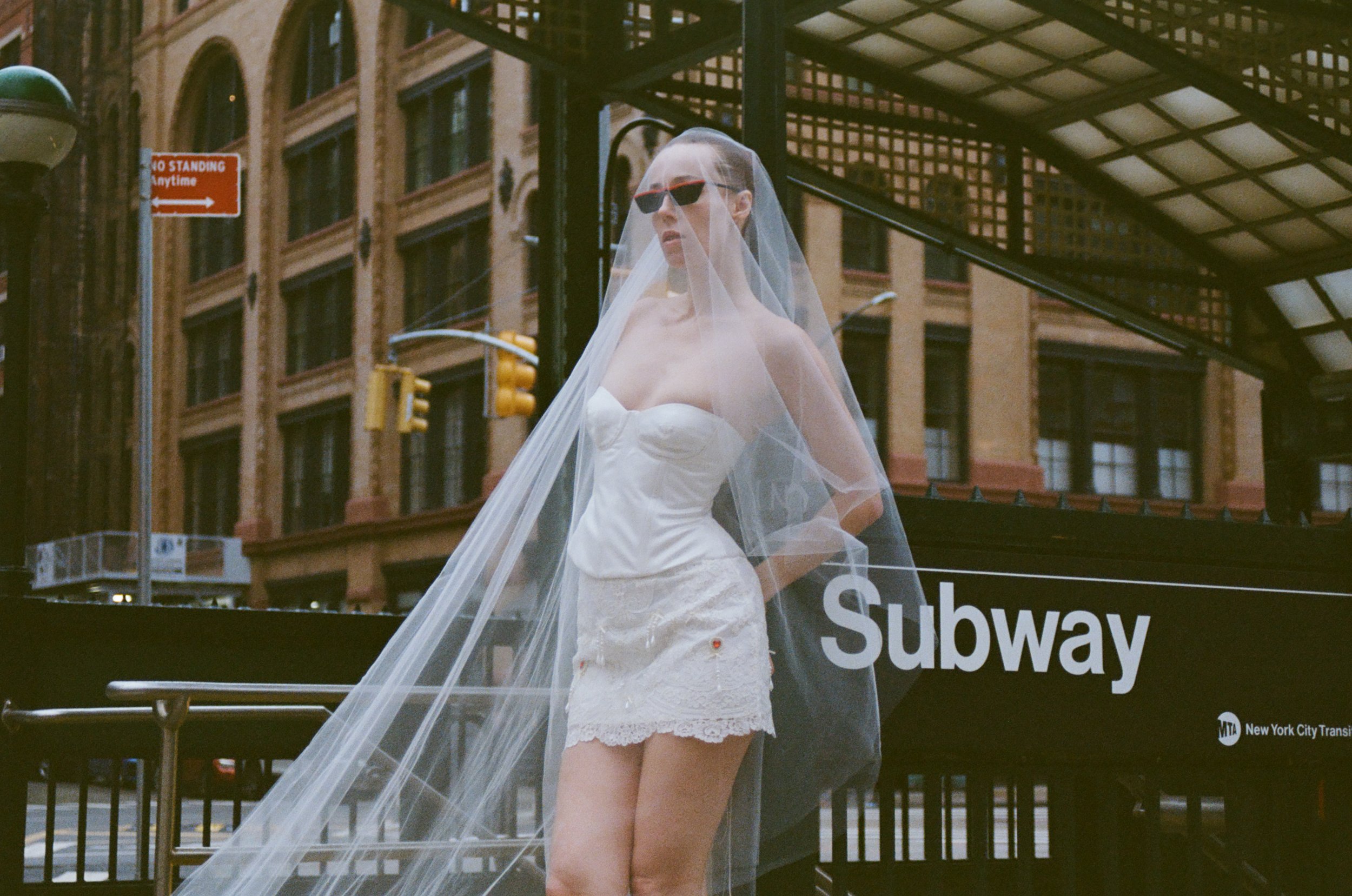 Close up of Riley Corset, Emma Blusher Veil and Tia Mini Skirt by LVR Bridal in the streets of New York City