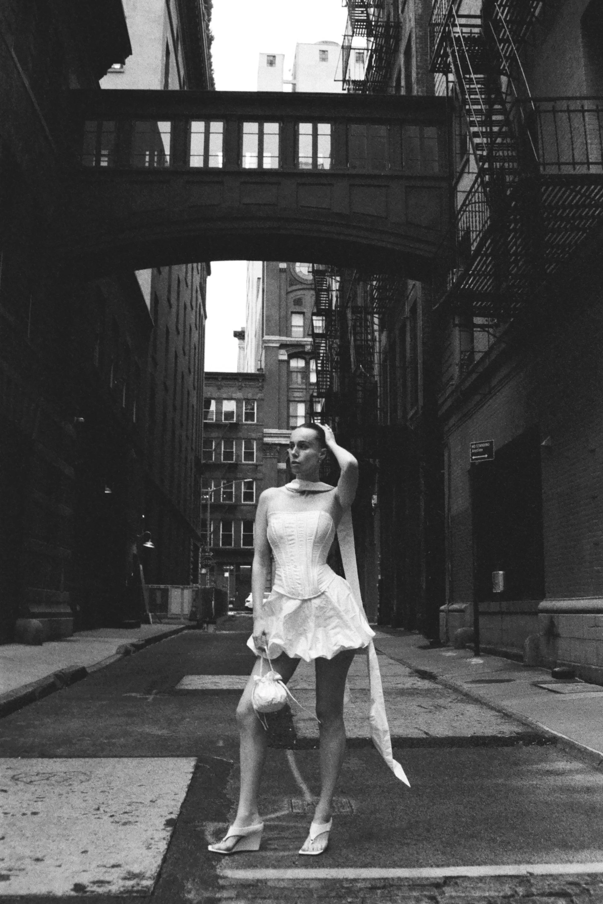 Close up of Sawyer Corset, Daphne Mini Skirt and Paloma Puff bag by LVR Bridal in the streets of New York City