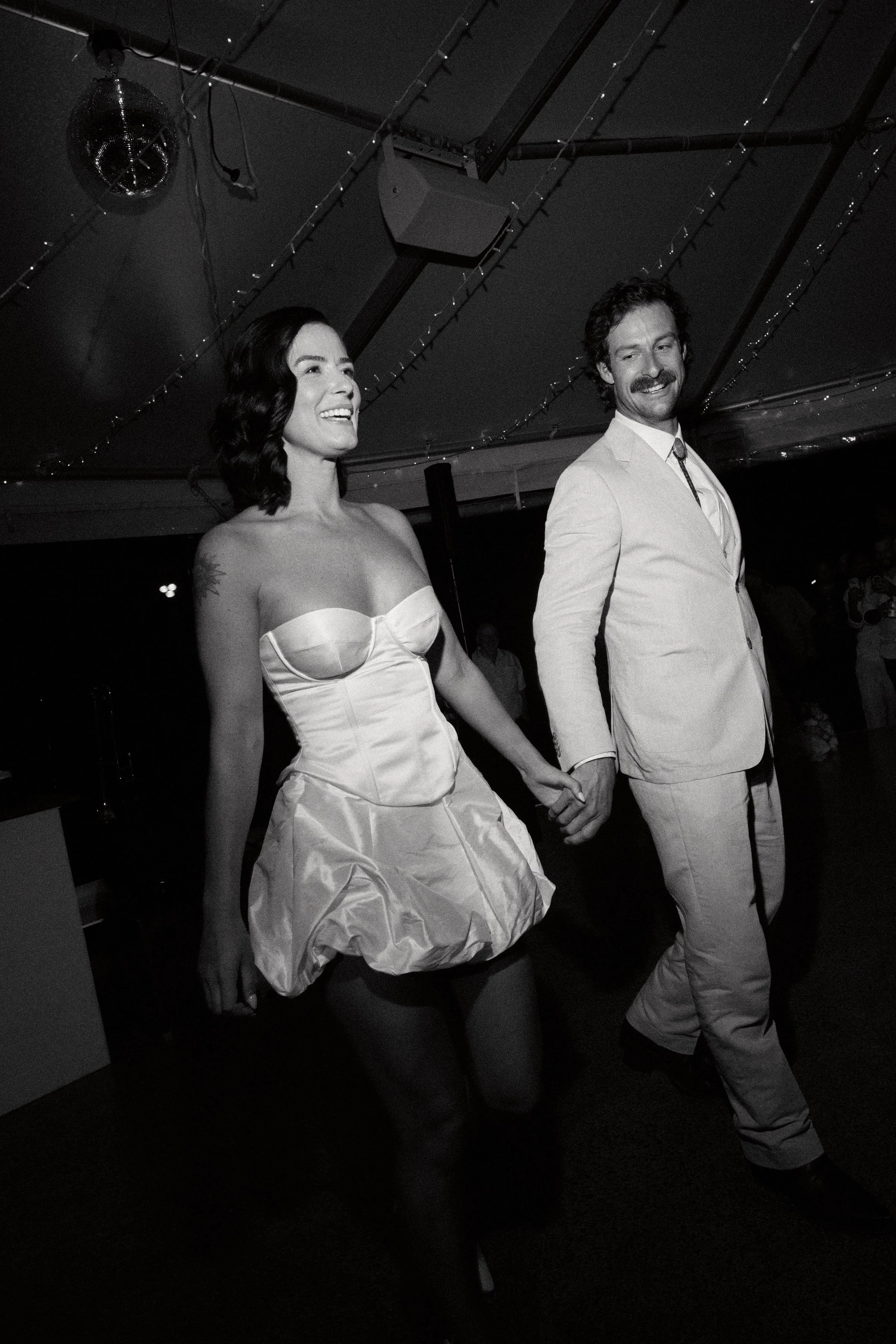 Aesha changes into our Daphne Mini for the dance floor