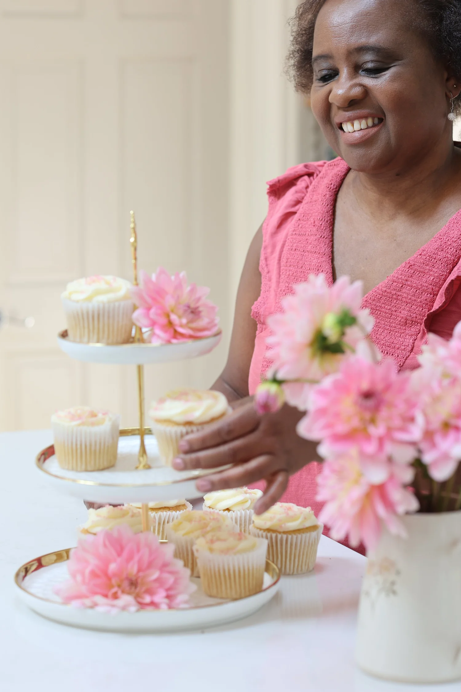 Lois presenting a beautifully finished celebration cake