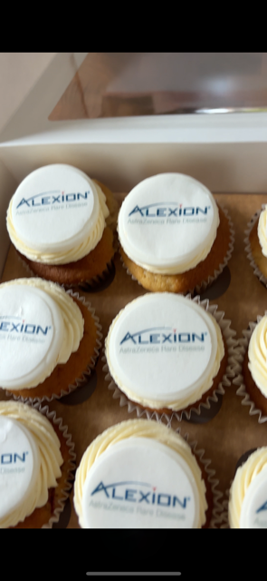 Branded corporate cupcakes with edible logo toppers