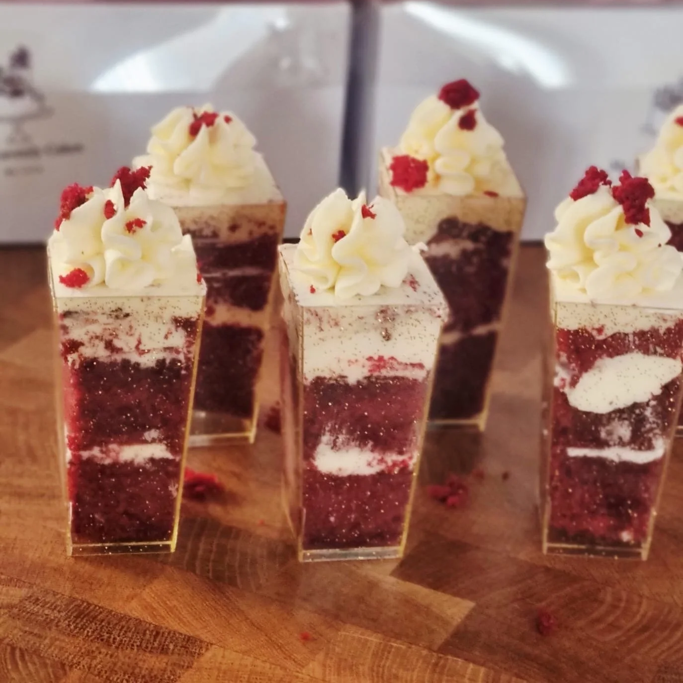 Corporate dessert shots presented at a professional event