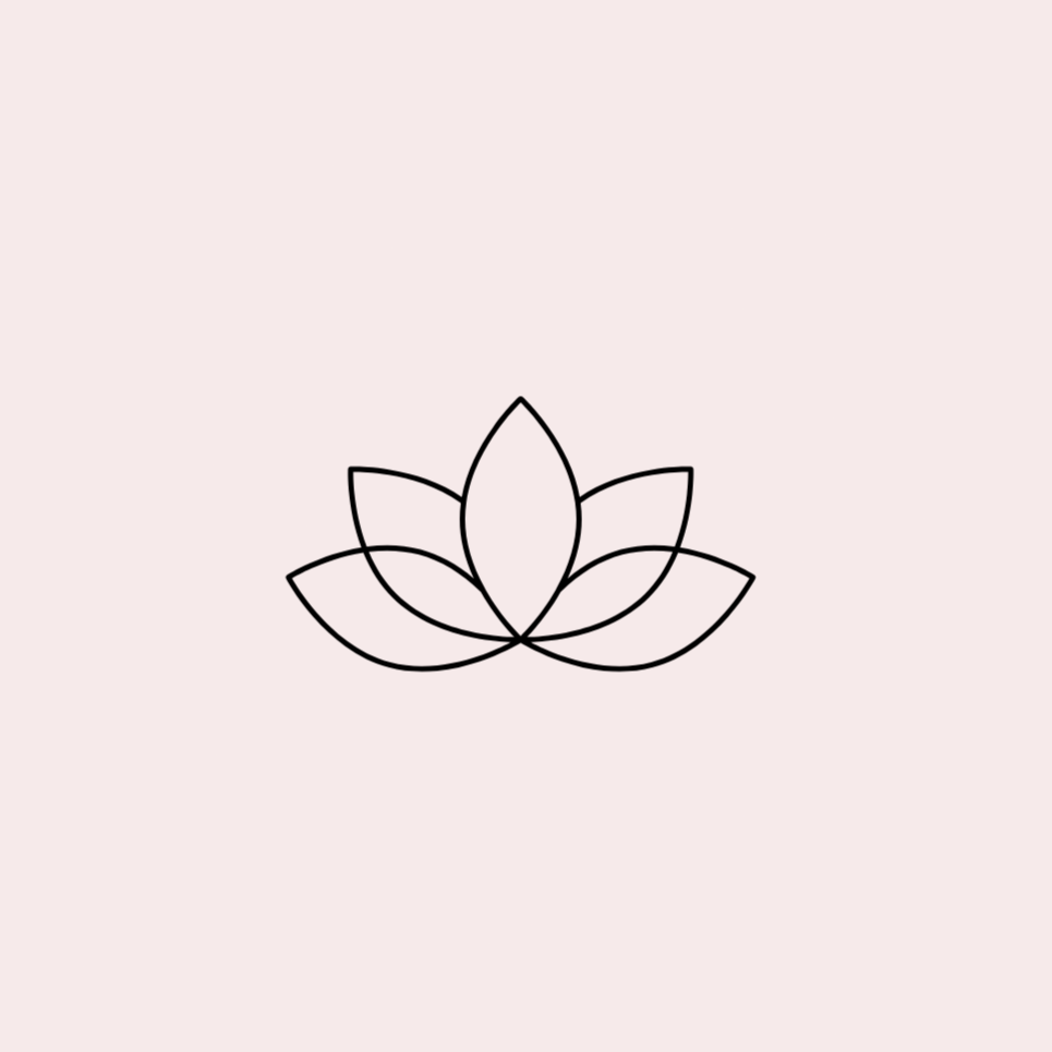 A lotus flower symbol on a pale pink background a casual indoor setting.