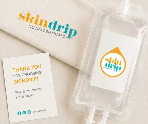 A skincare product from SkinDrip Nutraceuticals, including a clear pouch with a drop-shaped label and a thank you card, placed on a light background.