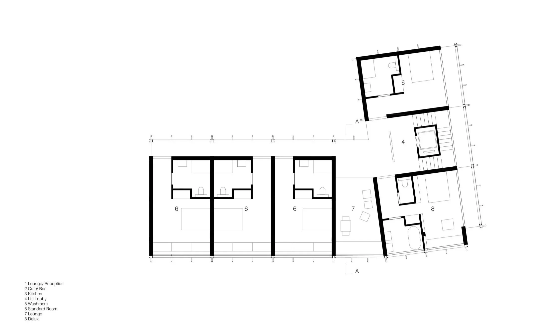 Architectural floor plan of a building with labeled rooms including lounges, kitchen, café/bar, washroom, standard and deluxe rooms, and lift lobby.