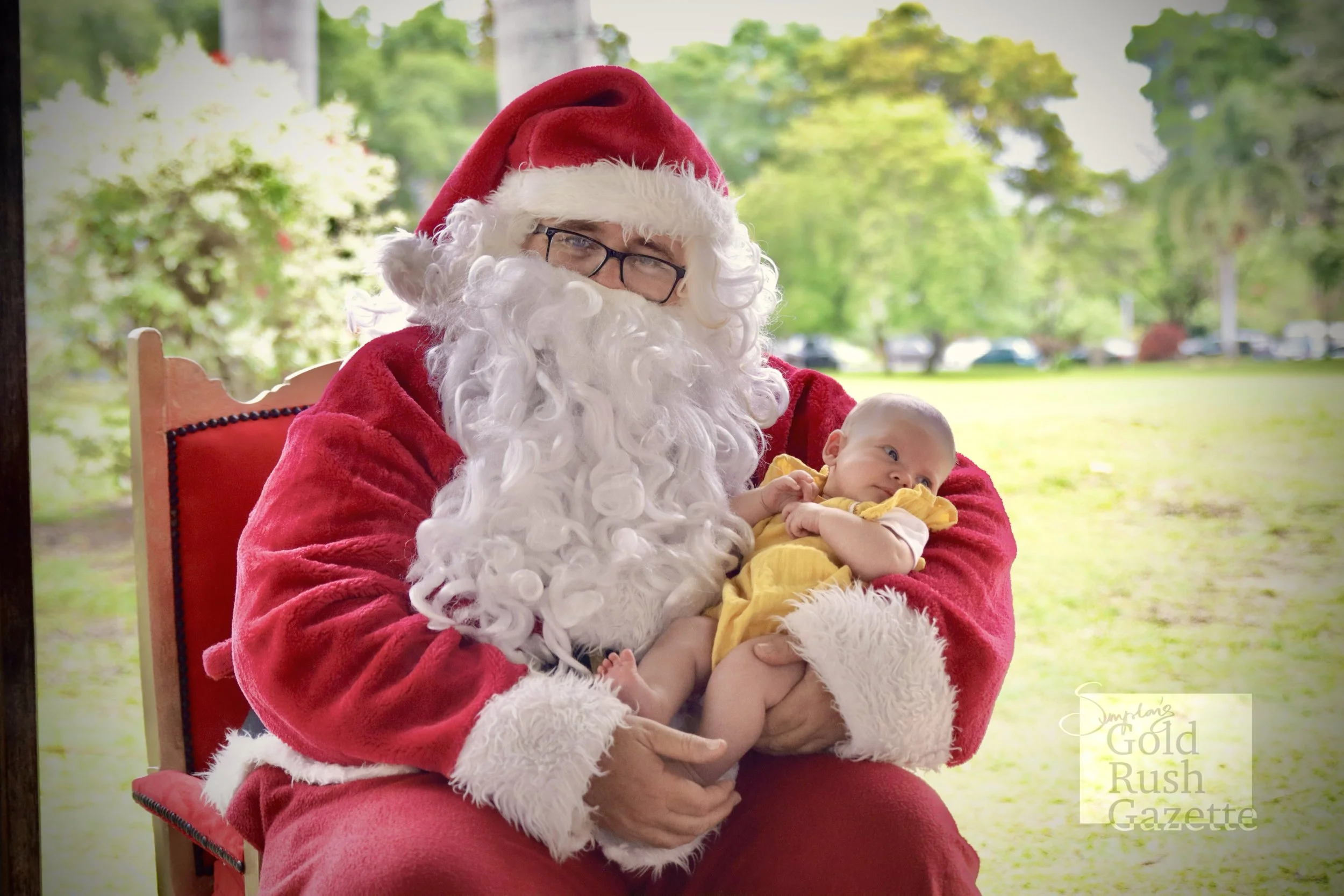 Photos with Santa at the Centenary Park Christmas Charity Markets hosted by Our Town Association Inc (2023)