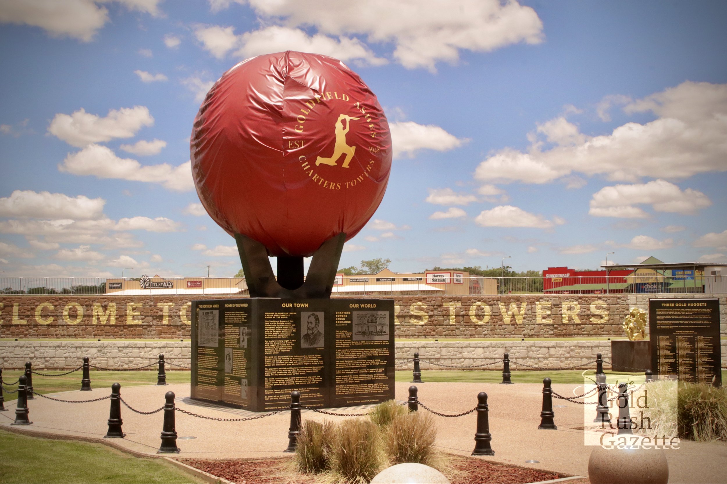 'The World' statue at Goldtower Central covered as a cricket ball in celebration of the Charters Towers Goldfield Ashes (2025)