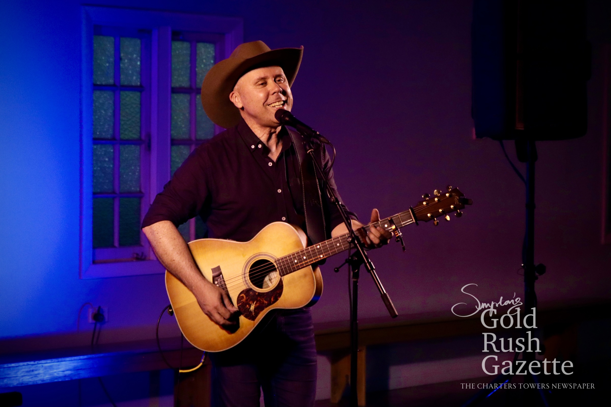 Brendon Walmsley performing at the Charters Towers QVWA Hall (2025)