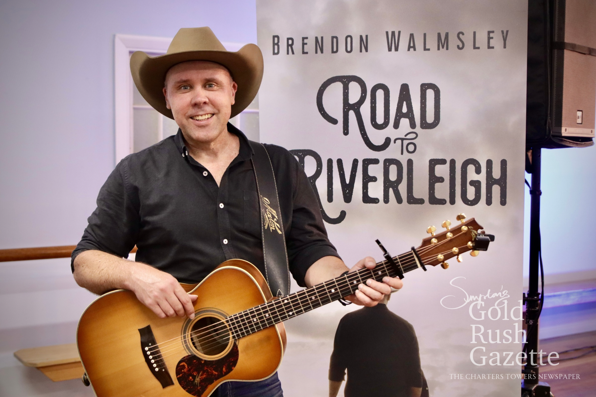 Brendon Walmsley performing at the Charters Towers QVWA Hall (2025)