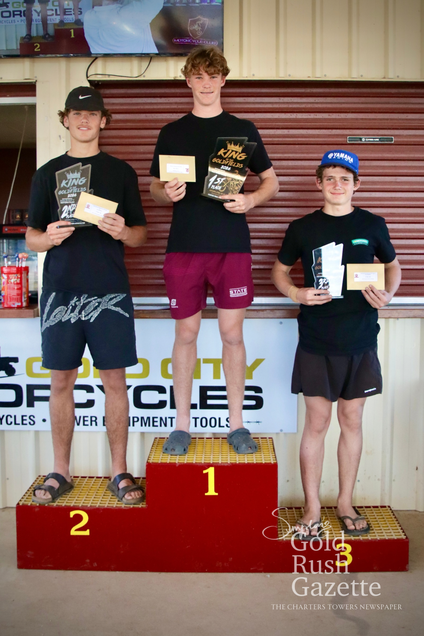 Junior Lites 13-Under16 winners Jaxon Downing (second), Hugo Williams (first), and Brian Rixon (third) at the 2026 King of the Goldfields awards presentation
