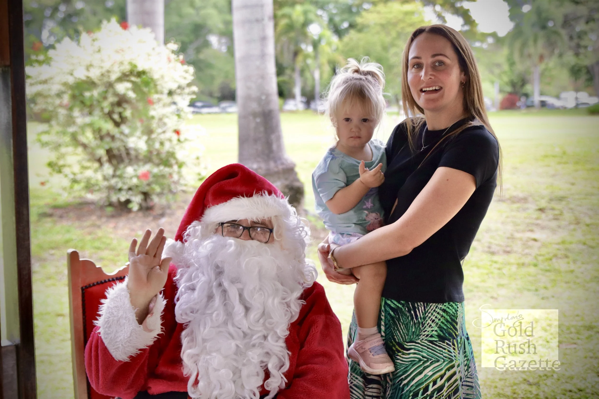 Photos with Santa at the Centenary Park Christmas Charity Markets hosted by Our Town Association Inc (2023)