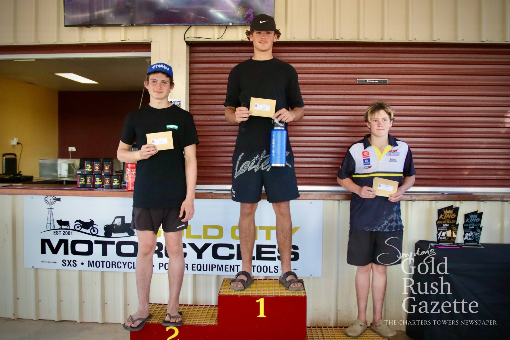 King of the Goldfield Junior Feature winners Brian Rixon (second), Jaxon Downing (first), and Mason Van Scherpenseel(third) awards presentation hosted by the Charters Towers Motorcycle Club