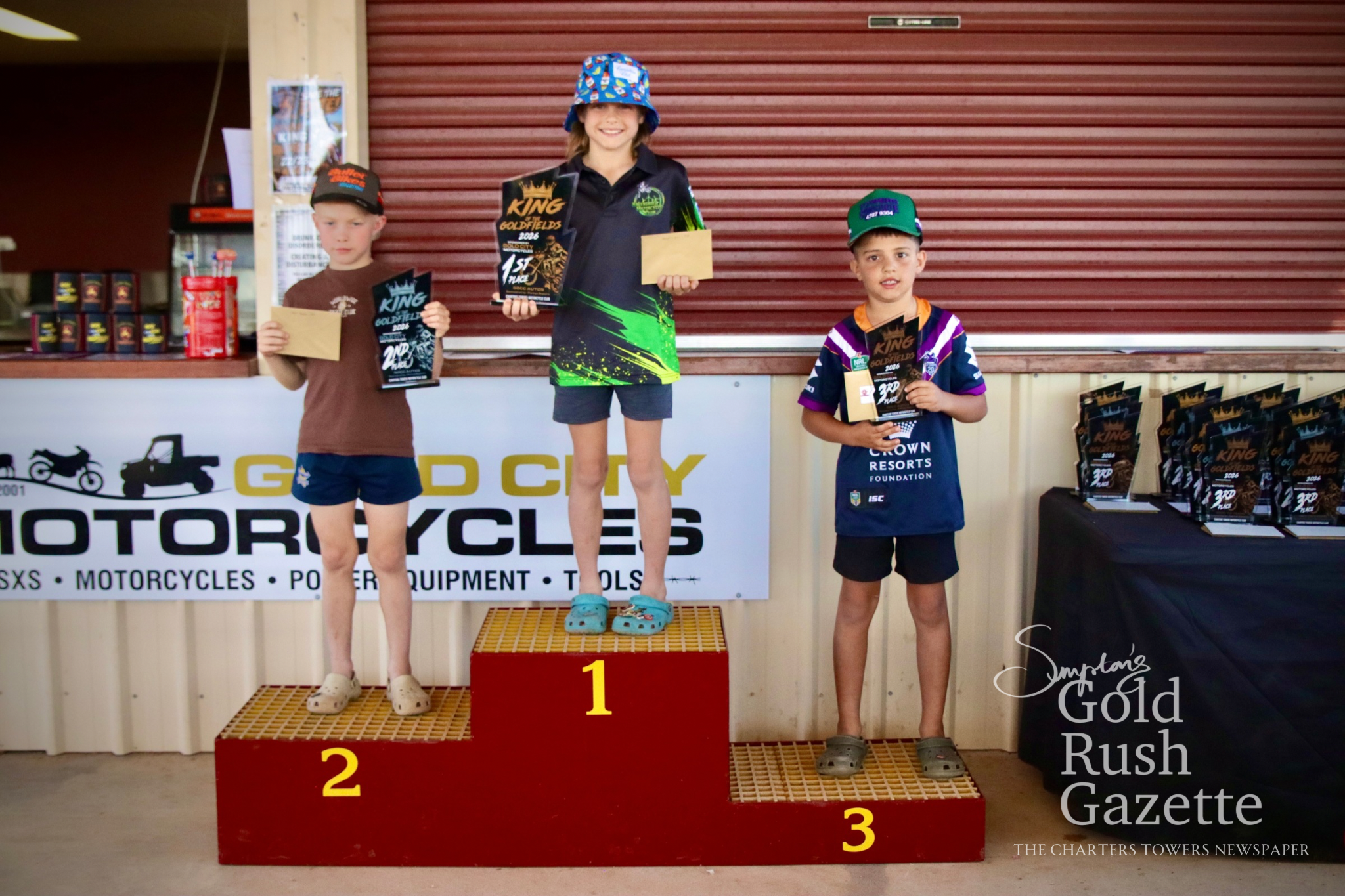 50cc Auto Overall winners Vance McNab (second), Benjamin Price (first), and Connor Serra 2026 King of the Goldfields awards presentation