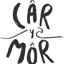 Stylized black handwritten text reading 'Lär y Mör' with decorative lines.