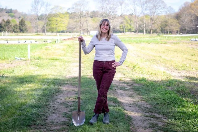 Carolyn Whipple Fraser standing in the field at Whipple Bee Flower Farm in Marblehead, Massachusetts, continuing her family’s legacy through sustainable flower farming.