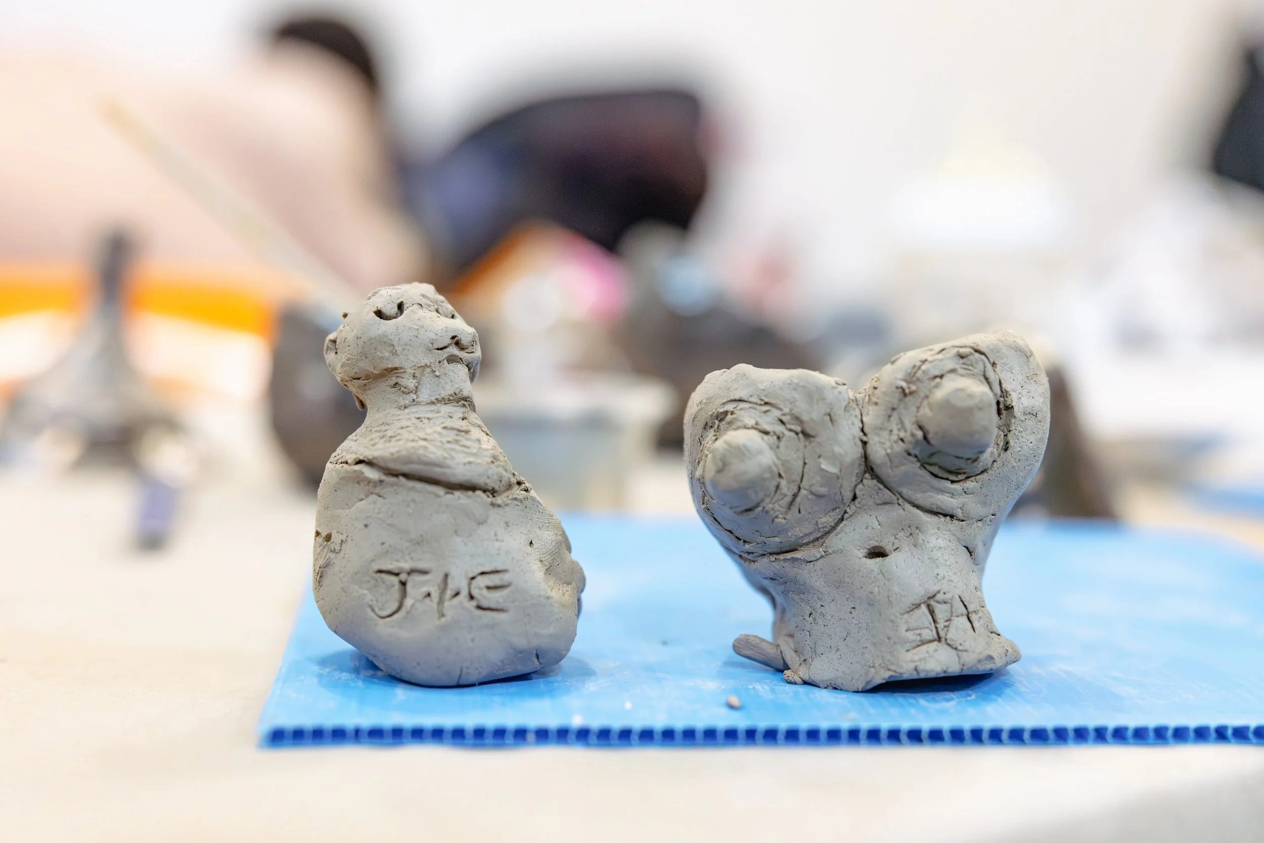 Two clay vessels in the shape of breasts