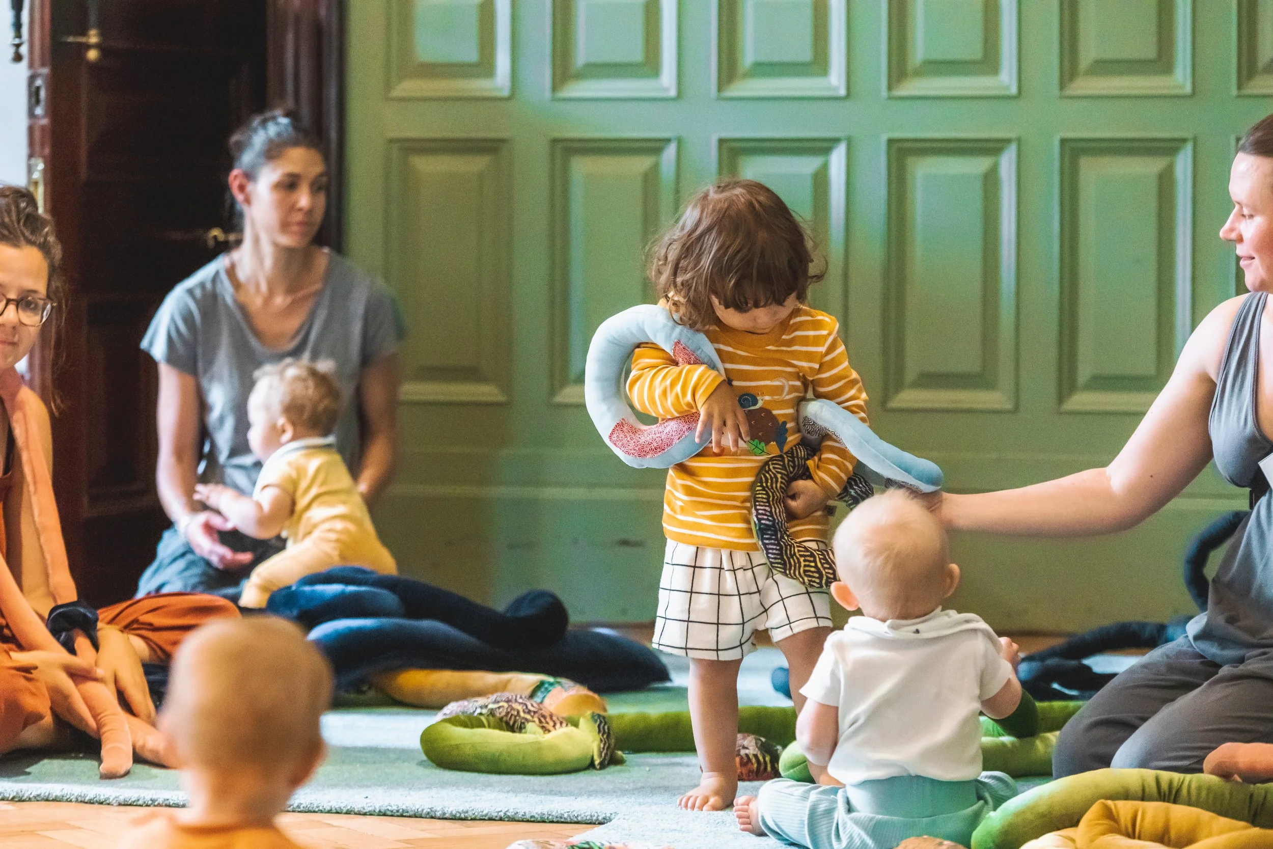 Photo of toddlers and babies playing in Sarah Marsh's installation.