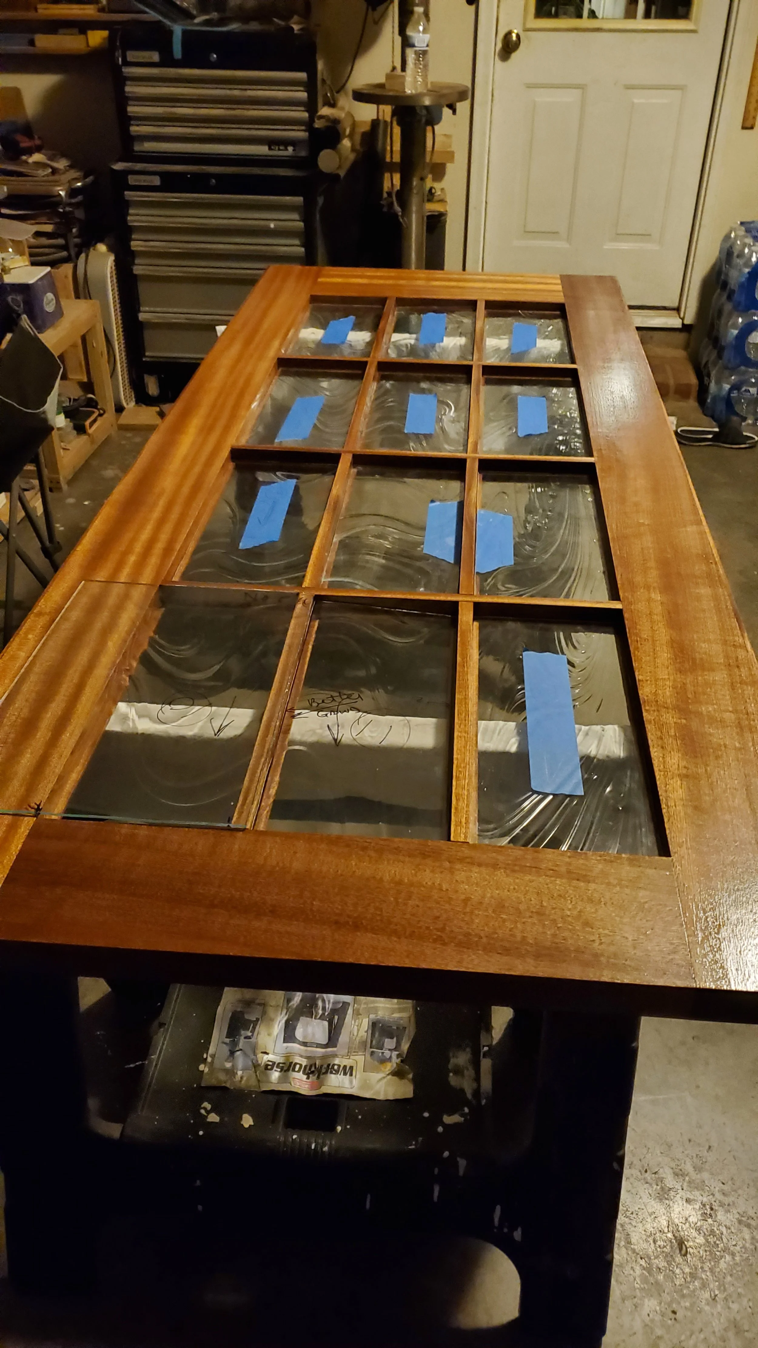 Door being fitted with specialized glass