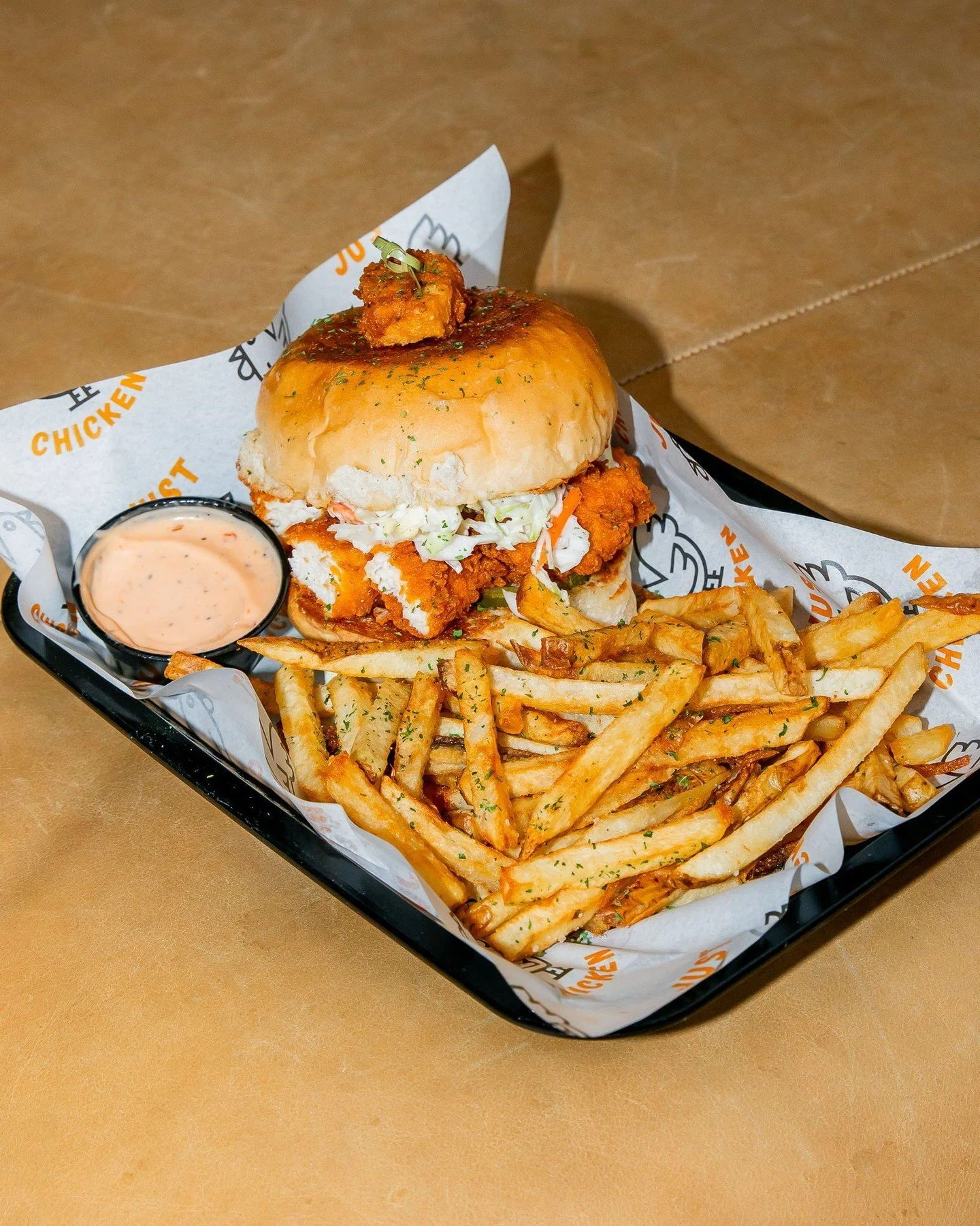 Golden, crispy tenders stacked inside the Just Sandwich, fresh slaw, that soft bun&hellip; and a side of perfectly seasoned fries.

Take a closer look. Crunchy, juicy, fresh in every bite. Some meals just hit different 🍗 

Tag someone who needs to t