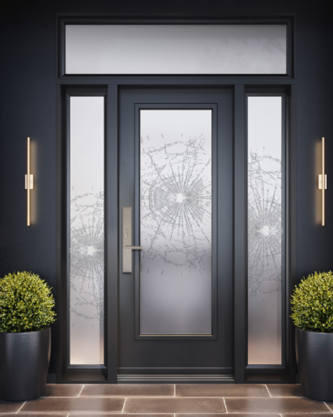 A modern black front door with shattered glass and matching side panels, flanked by potted green shrubs and illuminated by wall-mounted lights.