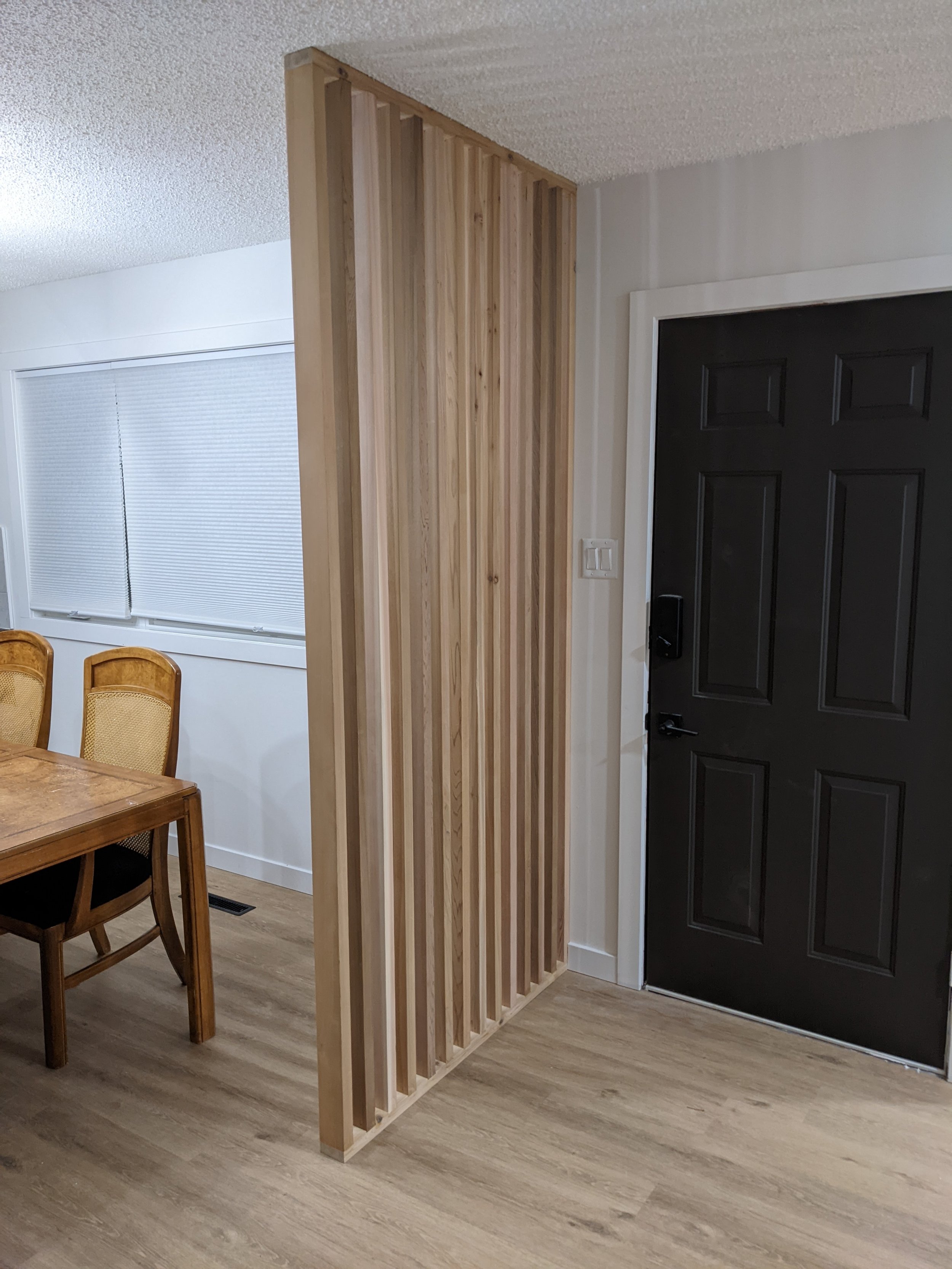 entry vertical slat wall