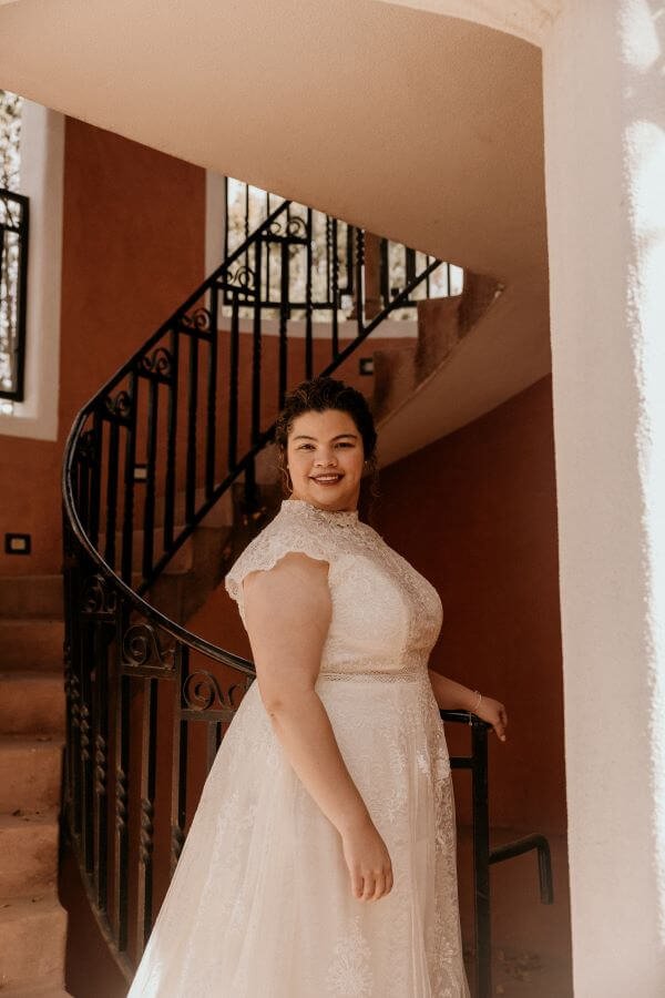 Bride in spiral staircase at El Ray Court, in Santa Fe, NM.jpg