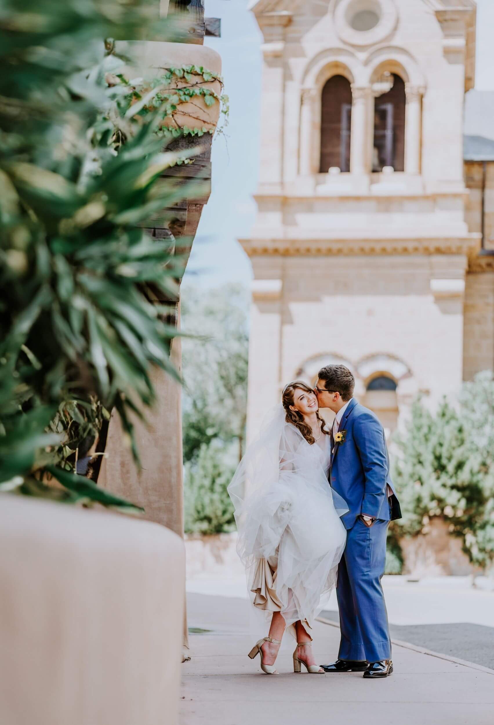Couple in front of The Cathedral Basilica of St. Francis of Assisi