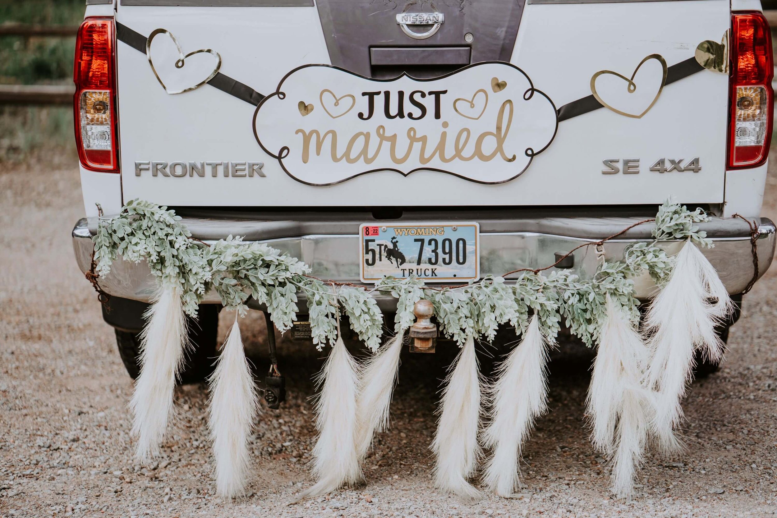 Just married sign on the back of truck 