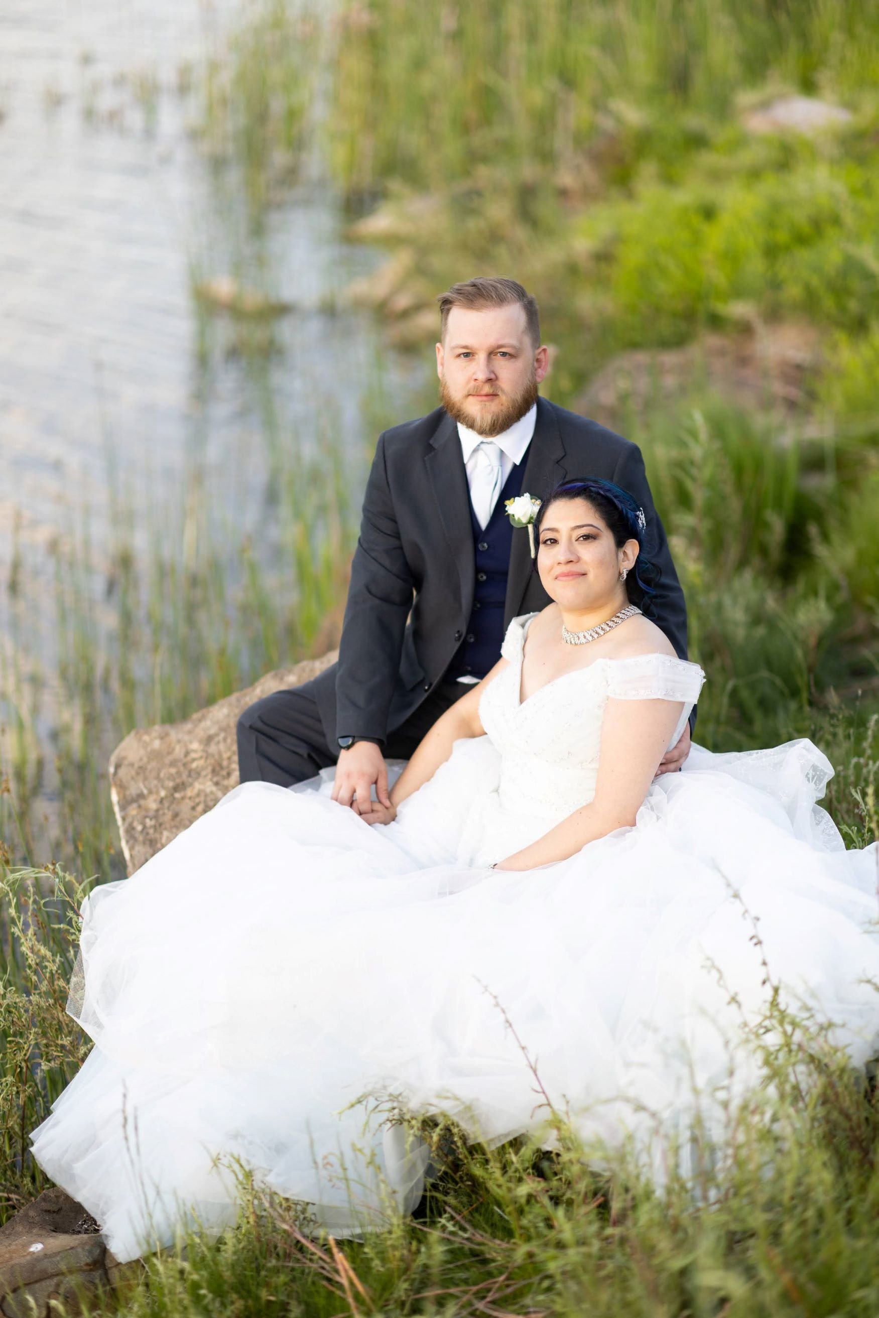 Bride and groom near the water.jpg