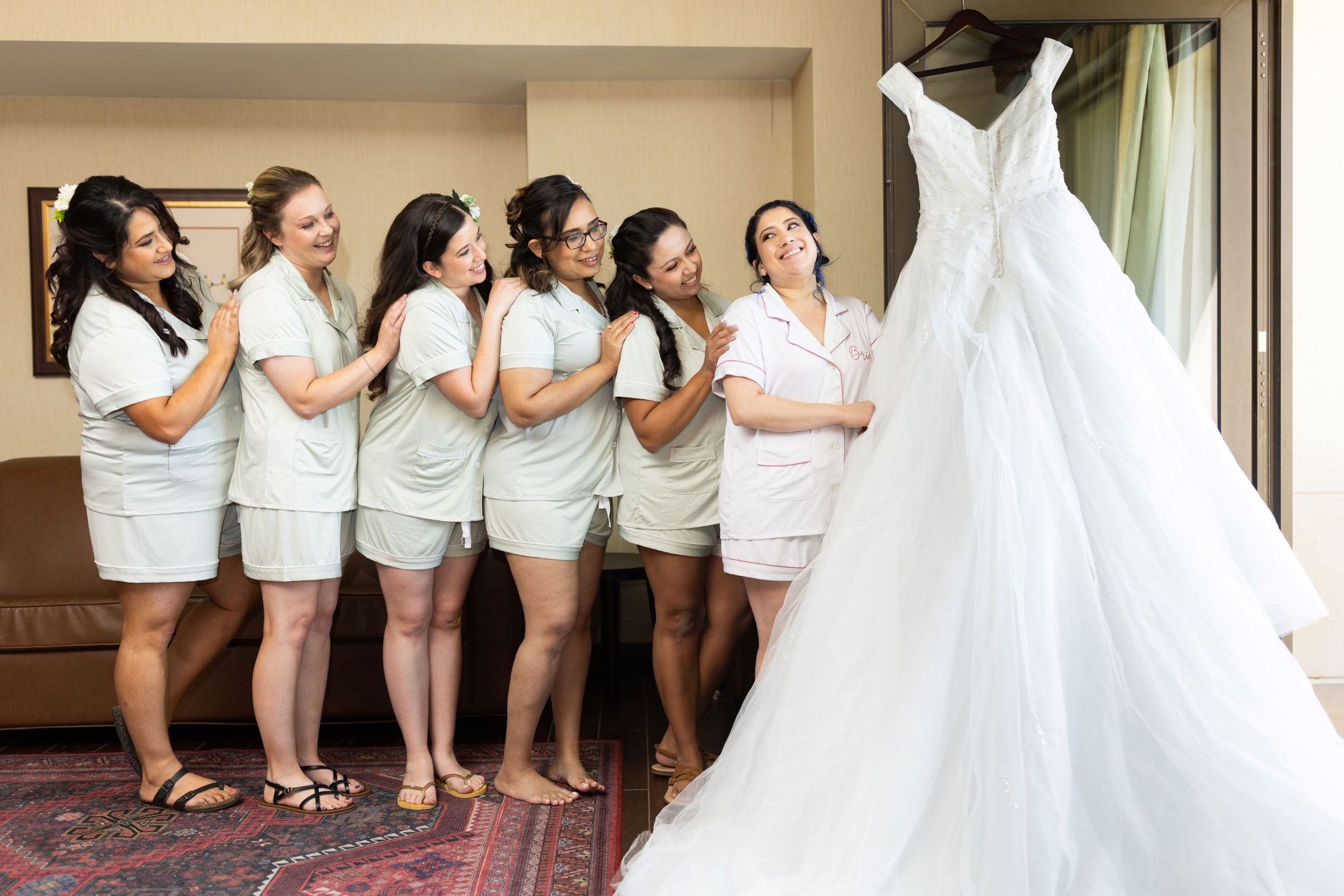 Bride with Bridesmaids and Dress.jpg