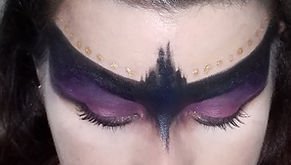 Purple Phoenix eye makeup.