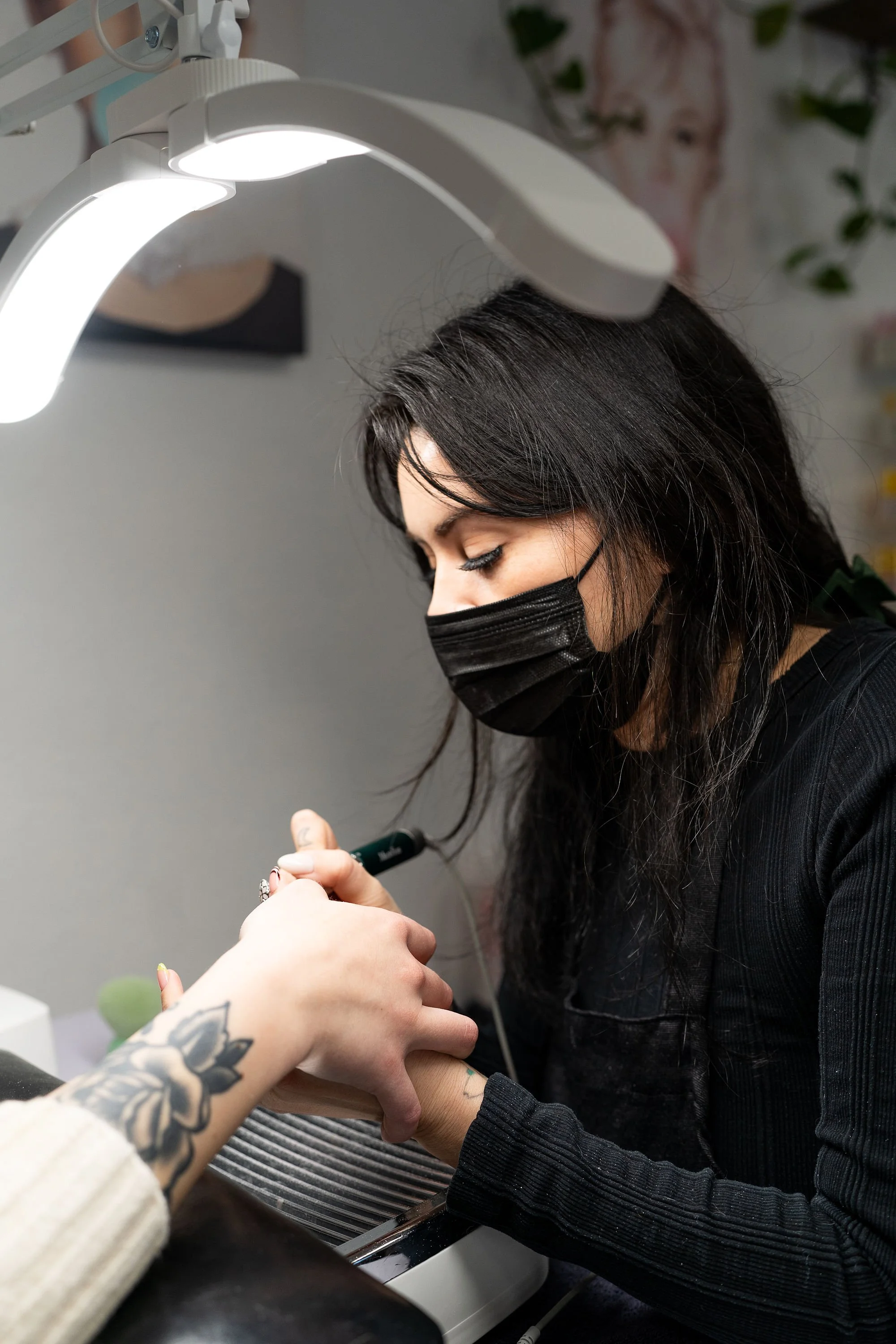 Pilar providing a nail service at Maxwell’s Salon & Spa in Olympia, WA