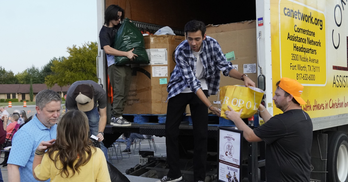 Men moving boxes
