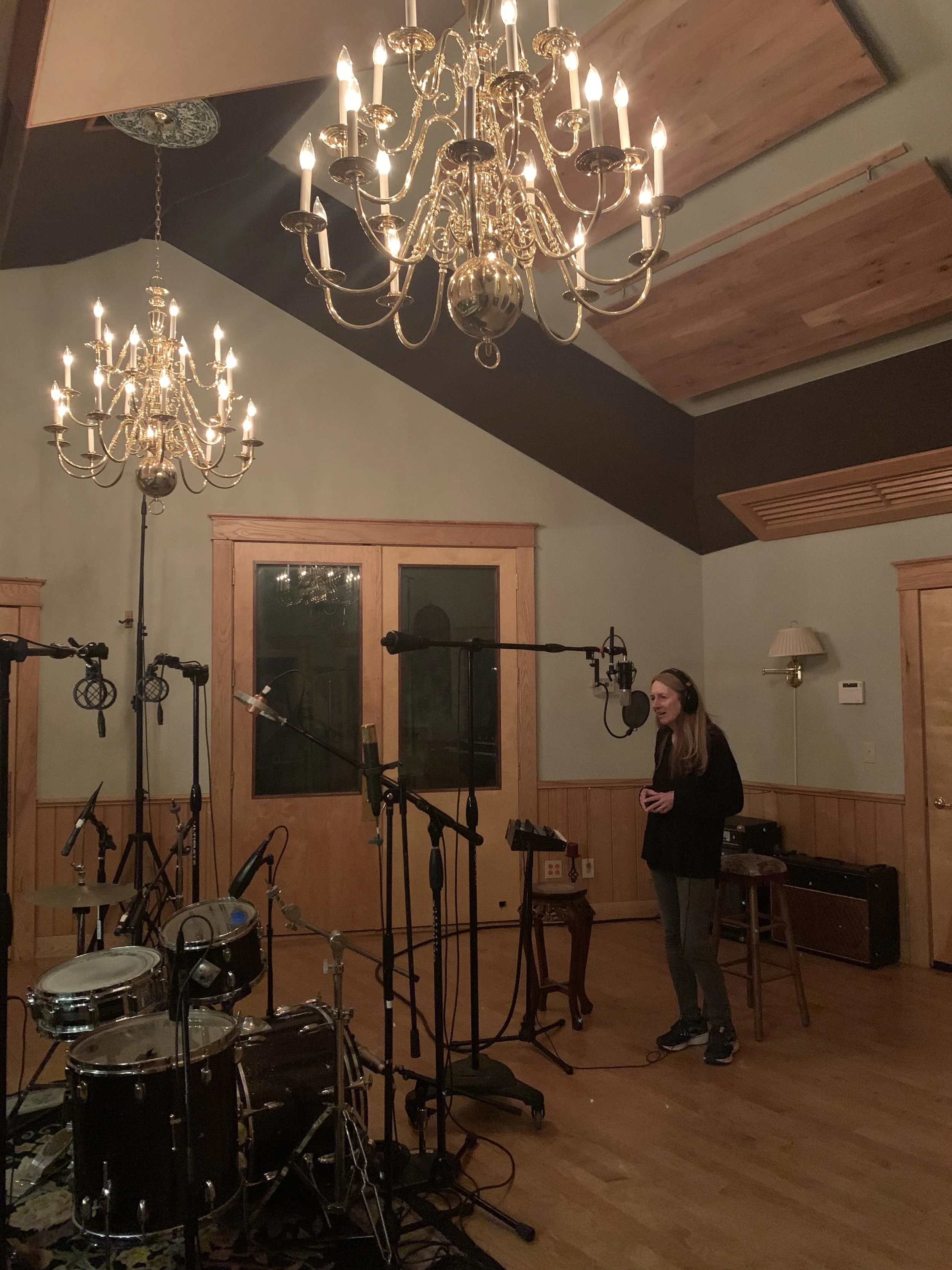 robin singing in tracking room copy (1).JPEG