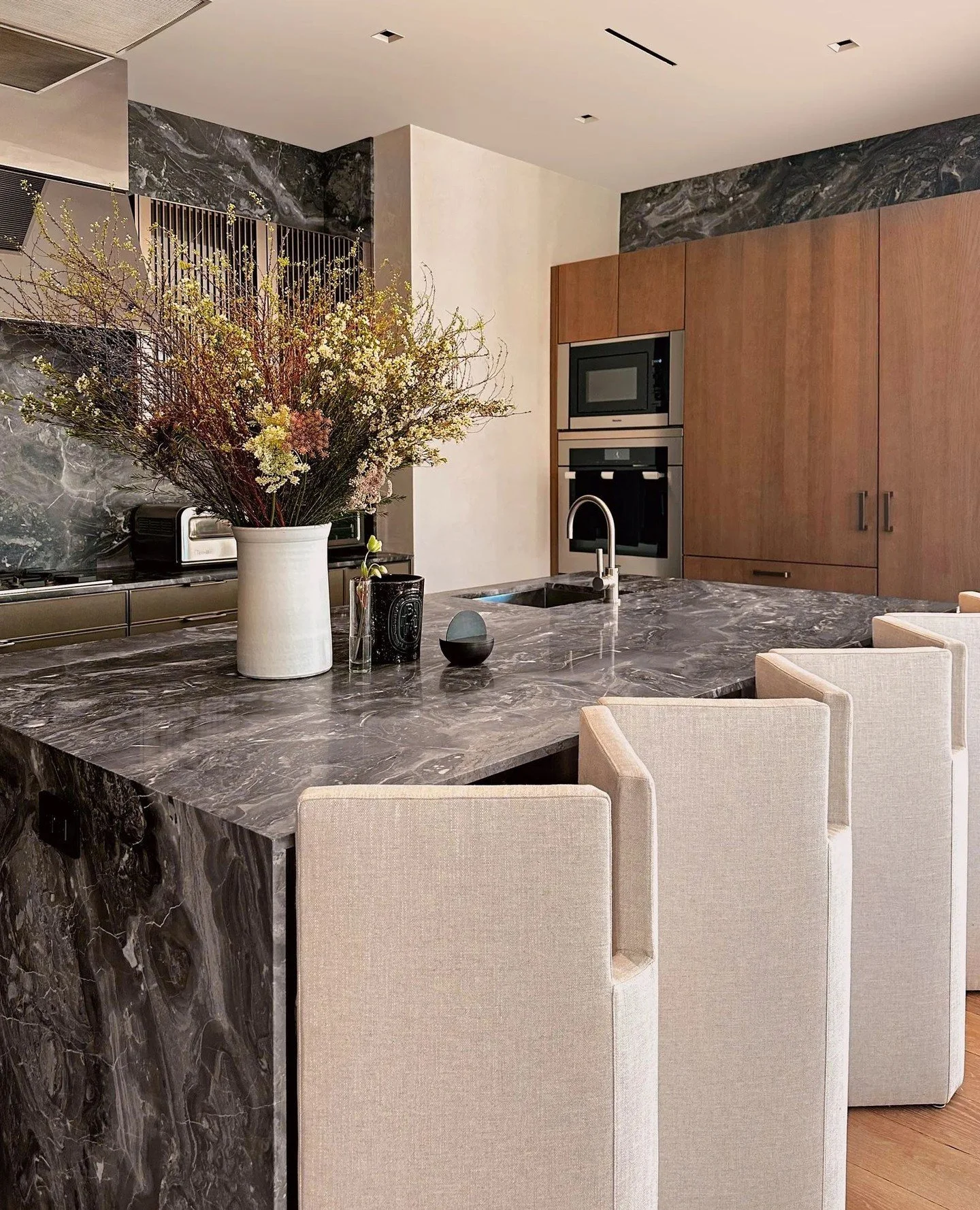 Inspiration via the @asthetiquegroup design firm, this home for a New York power couple featured in Architectural Digest, features the Marta Sala &Eacute;ditions Pedro bar stools, and in the dining room are the Lazzarini &amp; Pickering-designed Mure
