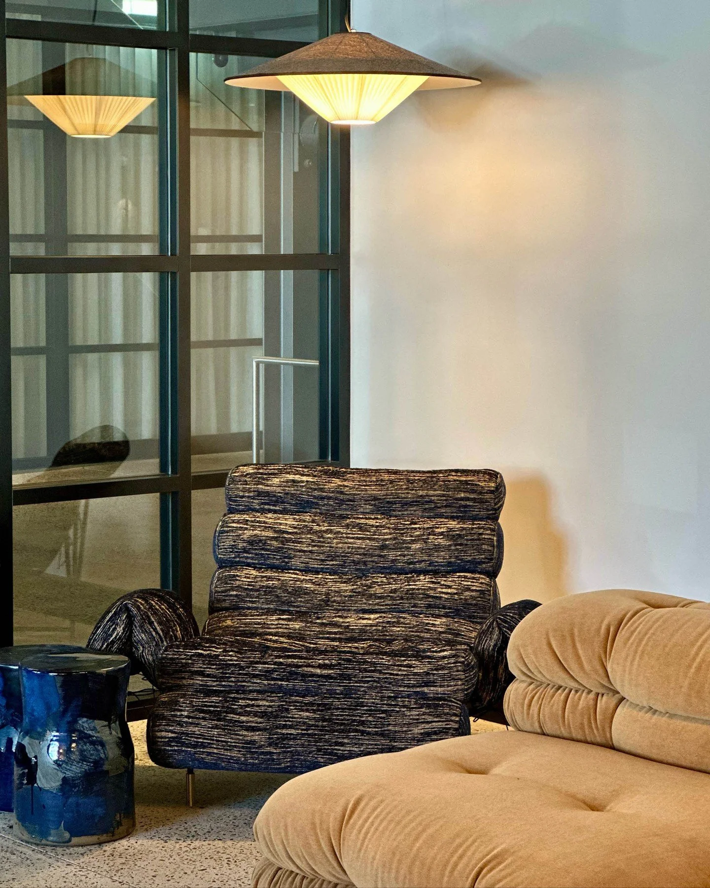 Today at the Gallery.
In the foreground is the Hessentia, 'Lowell' modular sofa. Behind, our custom Nuvola armchair upholstered in the Phinda Ré-Seize (PR.016), a luxury French fabric by TOYINE. Above is Servomuto's 'Otto' Ø70 brown pe