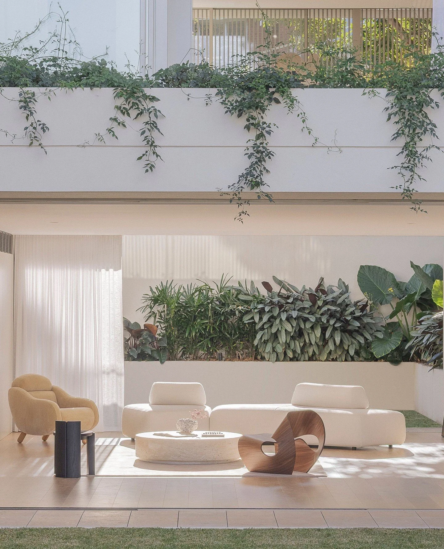 Inspiration via 'Greenwich Residence' styled by Kerrie-Ann Jones with Interior design and Architecture by Ess Lifestyle. ⁠
⁠
The sunlit home in Sydney's Northern suburbs features the Aur&eacute;lien Serre AS01 Armchair (both far left) and the Nenet C