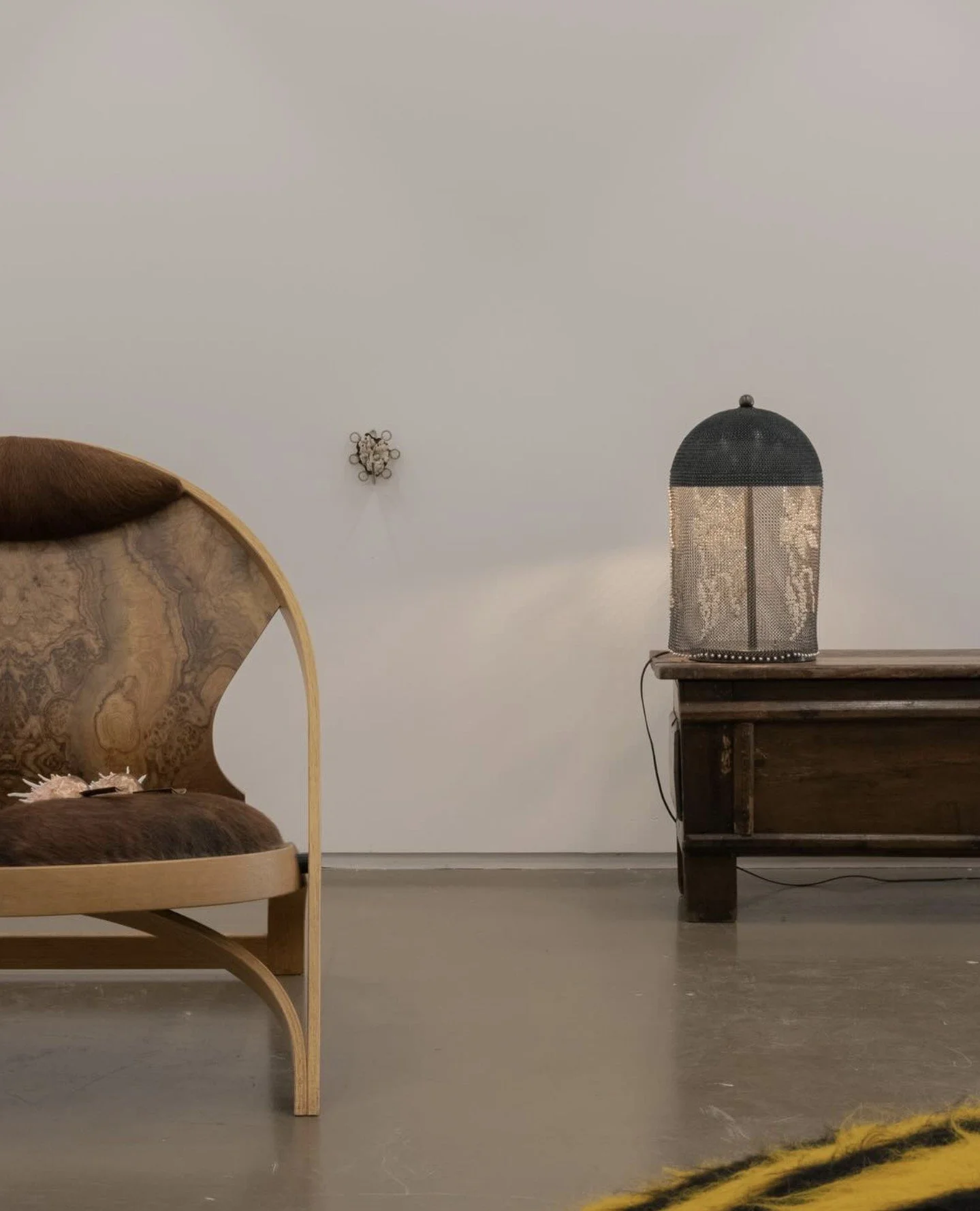 Images of pieces by Wretched Flowers, including the Chainmail Table Lamp I in Black Pewter with creamy white beads, and the Chainmail Floor Lamp III in Gold with Sesame Jasper, shown at Collectable Brussels, amongst a great curation of works.⁠
⁠
@wre