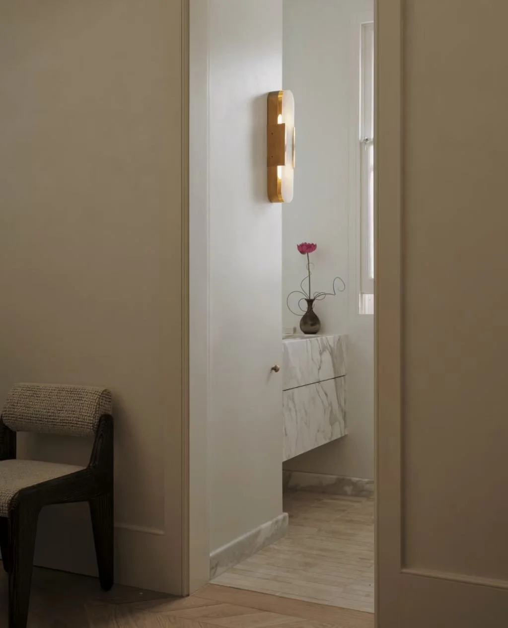 Creeping into the frame is the 'Laila' chair by Claudio Cappelini for Hessentia from Moebel in a home by Se D&eacute;a featured on @VogueLiving.⁠
⁠
"Se D&eacute;a transforms a Federation-era bungalow into a serene, sculptural home featuring a pa