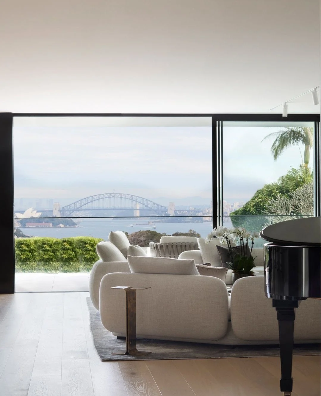 Set against the enviable backdrop of Sydney Harbour is Atelier Alwill's 'Bladerunner' residence. The beautiful home features two Dimoremilano 'Putrellino' side tables, designed by Dimorestudio, composed of two C-shaped elements in polished oxidised b