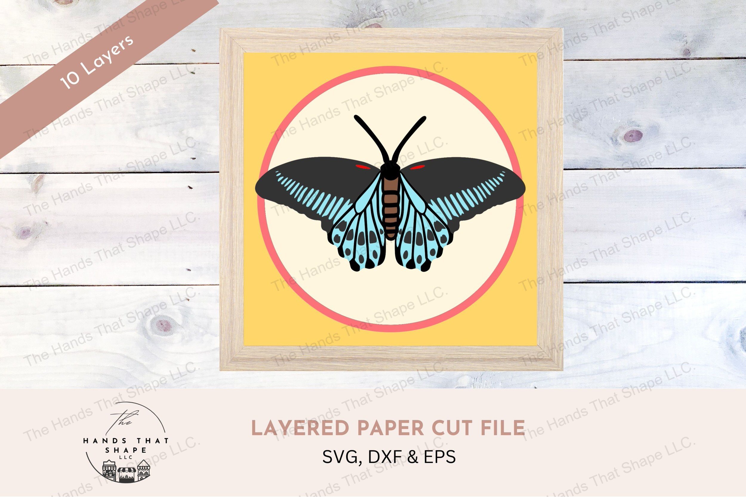 This layered cardstock art piece beautifully captures the striking Blue Mormon Butterfly in full spread, creating a captivating visual display.