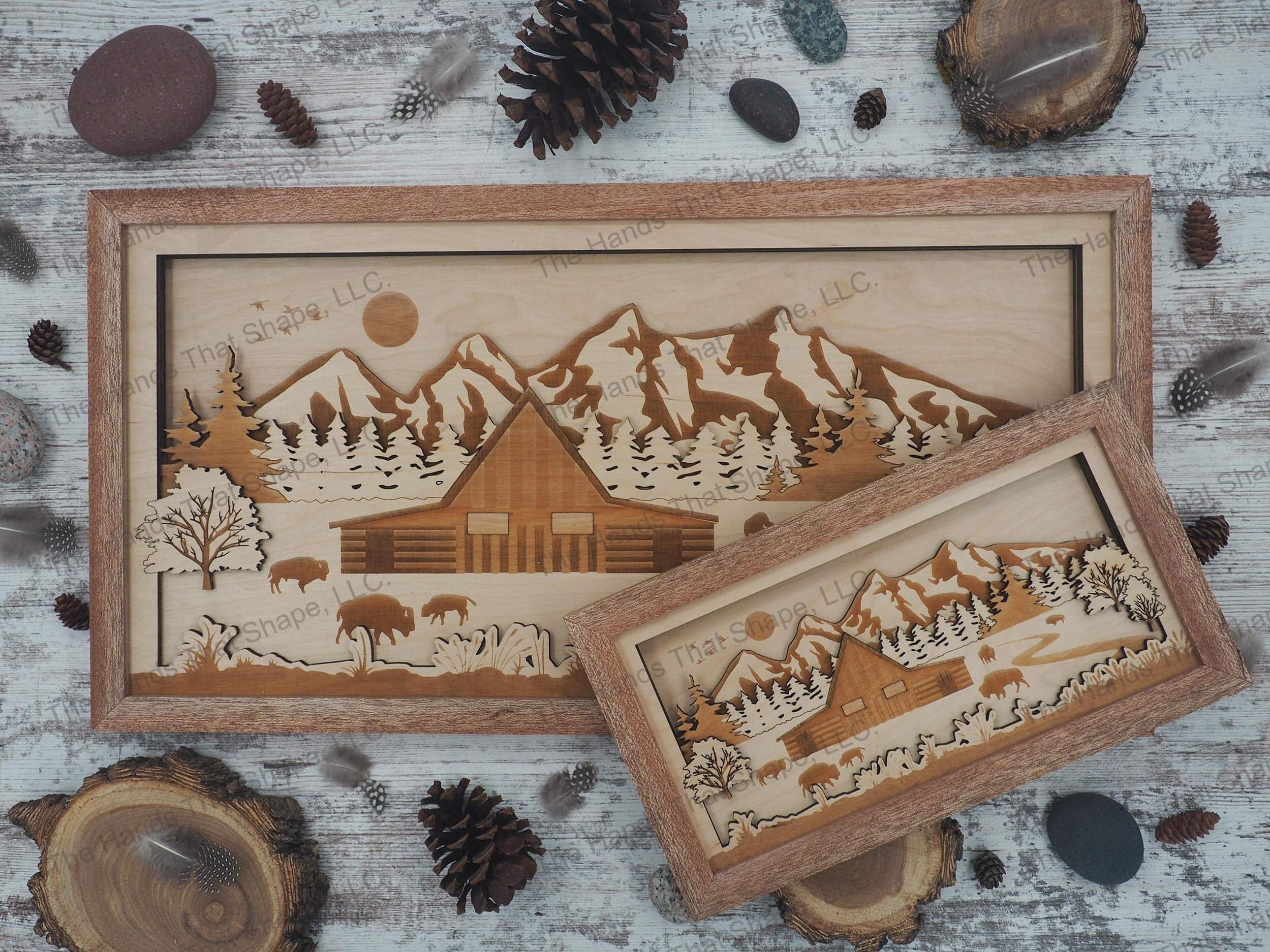 3D shadow box showcasing an old weathered barn, bison herd, pine forest and a majestic mountain range.